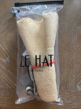 - Natural Straw Women’s Sun Hat